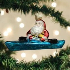Old World Christmas Blown Glass Santa In Kayak Ornament