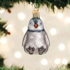 Old World Christmas Blown Glass Sitting Penguin Chick Ornament